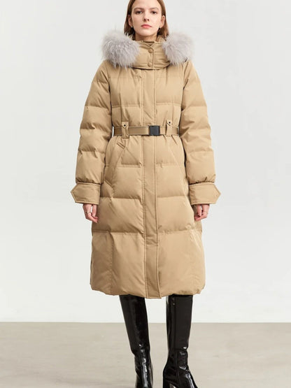 Front view of camel-colored puffer coat with fur hood, hands by sides