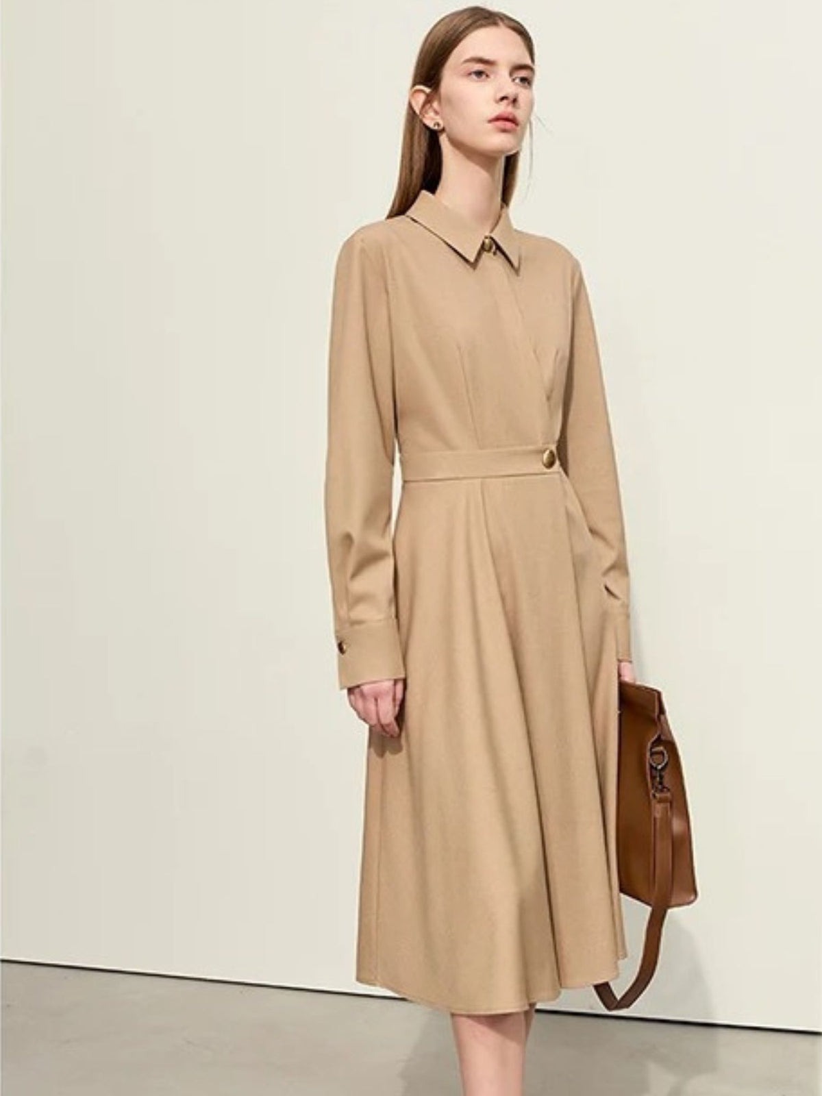 Front view of camel long-sleeve midi dress with pointed collar and gathered waist